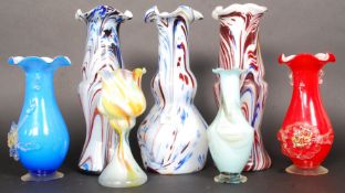 A collection of studio glass some examples by Murano to include end of day vases and others.