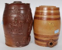A 19th stoneware spirit barrel being marked R for Rum in gilt together with a stoneware heavily