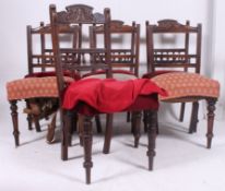 A harlequin set of 7 Edwardian mahogany dining chairs ( 4 + 3 ) all with similar carved back rests,