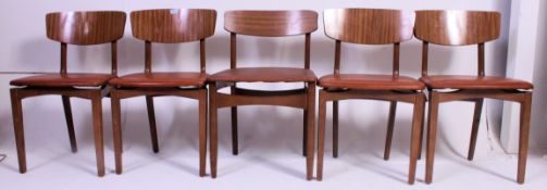 A set of four retro 1960's panel back  dining chairs having vinyl seat pads along with another