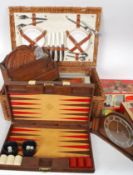 A mixed lot to include a vintage picnic hamper (with part contents), assorted various games,