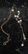 A 9ct gold (marked) yellow metal necklace with faux pearl decoration
