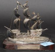 A hallmarked silver model of The Mary Rose.