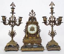 A good 19th Century gilt metal  French Cartel Clock garniture - candelabra raised over wooden socle