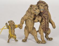 A three piece bronze set in the form of lions