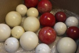A collection of early 20th century snooker balls / billiard balls