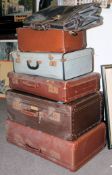A stack of vintage leather suitcases from the 20th century to include example with White Star Line