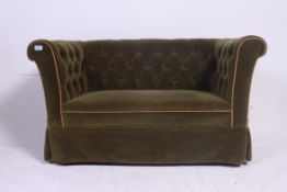 A rare Victorian Childrens sized two seat chesterfield sofa settee.