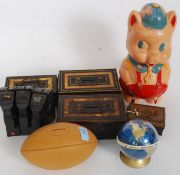 A collection of vintage money tins and piggy banks to include Lloyds etc