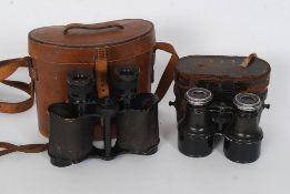 Two pairs of binoculars to include Ross Of London and another pair, unnamed.