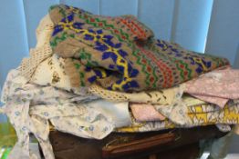 A collection of vintage early 20th century 1940's clothes to include tank top knitted,