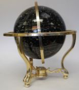 A Lapis Lazuli globe entitled Nightsky issued by the Guildford Astronomical Society.