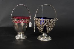 An Edwardian rococo silver plated sucrier having a blue glass liner together with another sucriere