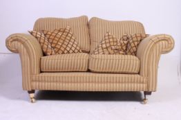 Antique style Kirkdale quality 2 seat sofa settee raised on mahogany tapered legs with brass cap