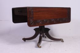 A 19th century Regency mahogany sofa table,