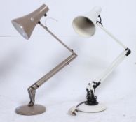 A retro Herbert Terry anglepoise lamp in brown along with another of similar form. 90 cm tall.