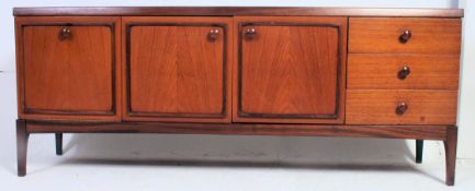 A vintage teak mid 20th century Danish style sideboard with banded door detailing and solid wood