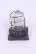 A vintage mid 20th century Industrial bulk head light by The Lighting Fitting Co ( stamped )being