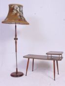 A retro 1950's British origin telephone table and similar standard lamp complete with shade.