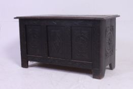 An early to mid 20th century Jacobean style oak coffer,