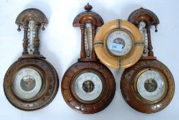 A set of three 20th century matching wall aneroid barometers,
