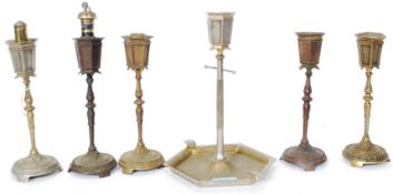 An unusual brasswares set, each piece in the form of a street light to include ashtray,