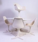 A retro 1970's Eero Saarinen for Arkana tulip dining table and five dining chairs,