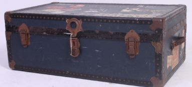 A vintage 20th century steamer trunk in blue with clasps to centre.