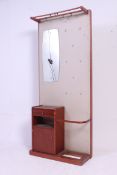 A vintage retro 1970's vinyl upholstered hall stand having miror upright with teak cabinet flanked