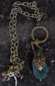 A Chinese Jade and yellow metal necklace hacing filigree worked hoop over yellow metal worked mount