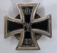 A First World War German WW2 Iron Cross screw back version complete with back plate marked 20