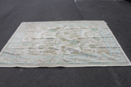 A 20th century Laura Ashley contemporary cotton and wool floor rug having being ground with blue