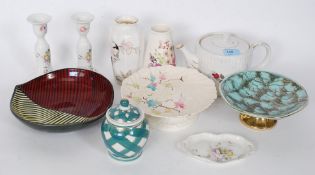 A collection of china to include chintz pattern vases, studio pottery,