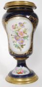 An early 20th century continental Meissen - Dresden style ceramic and brass lined vase.