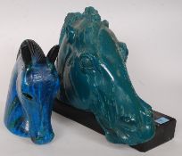 An unusual 20th century plaster study of a horses head on a squared plinth base, unsigned.
