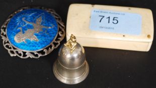 A hallmarked contemporary silver snuff bottle with teddybear atop,