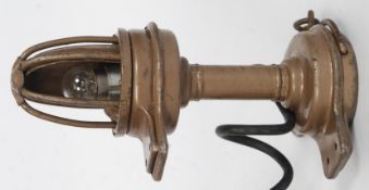 A charming vintage Lucas stamped classic car engine inspection lamp, with caged bulb to top.