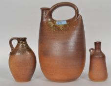 Muchelney studio pottery stoneware handled flagon by John Leach dating from the 20th century.