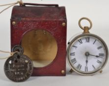 A vintage American drum clock by Waterbury complete with the original leather case.