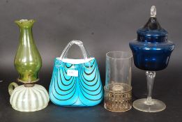A collection of studio glassware to include Murano style blue glass handbag,