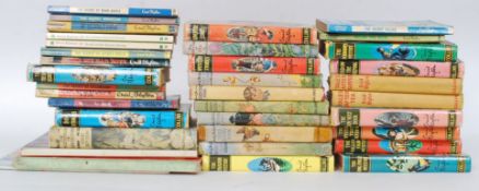 A good collection of Enid Blyton hard back books most with original dust jackets several 1st
