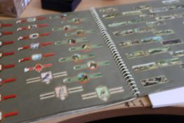 A fabulous album of cigar lablels together with a collection of stamps and ephemera to include