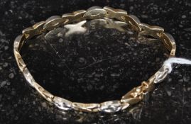 A 9ct gold ladies contemporary linked bracelet. Total weight 10.