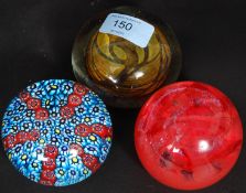 A Caithness paperweight together with a Millefiori paperweight and one other marked to underside