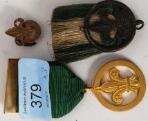 SCOUTING INTEREST. A gilt medal being engraved for KS Binnie with the date 22.06.49.