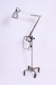 A large retro / vintage industrial floor standing machinists / draughtsman's angle poise lamp