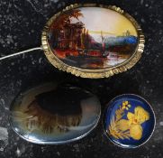 A collection of three vintage brooches to include polished stone,