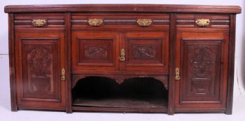 An Edwardian mahogany Art Nouveau dresser base sideboard.