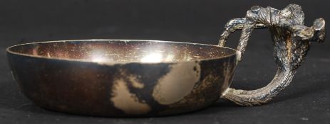 An A Gordon-Evans hallmarked silver bark effect handled ash tray.