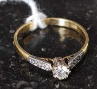 An 18ct gold diamond engagement ring having central stone on plain shank. Total weight 2.